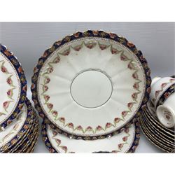 Early 19th century Royal Albert Imari pattern part tea service, comprising eight teacups, eleven saucers, twelve side plates, open sucrier, and two larger plates, all stamped beneath