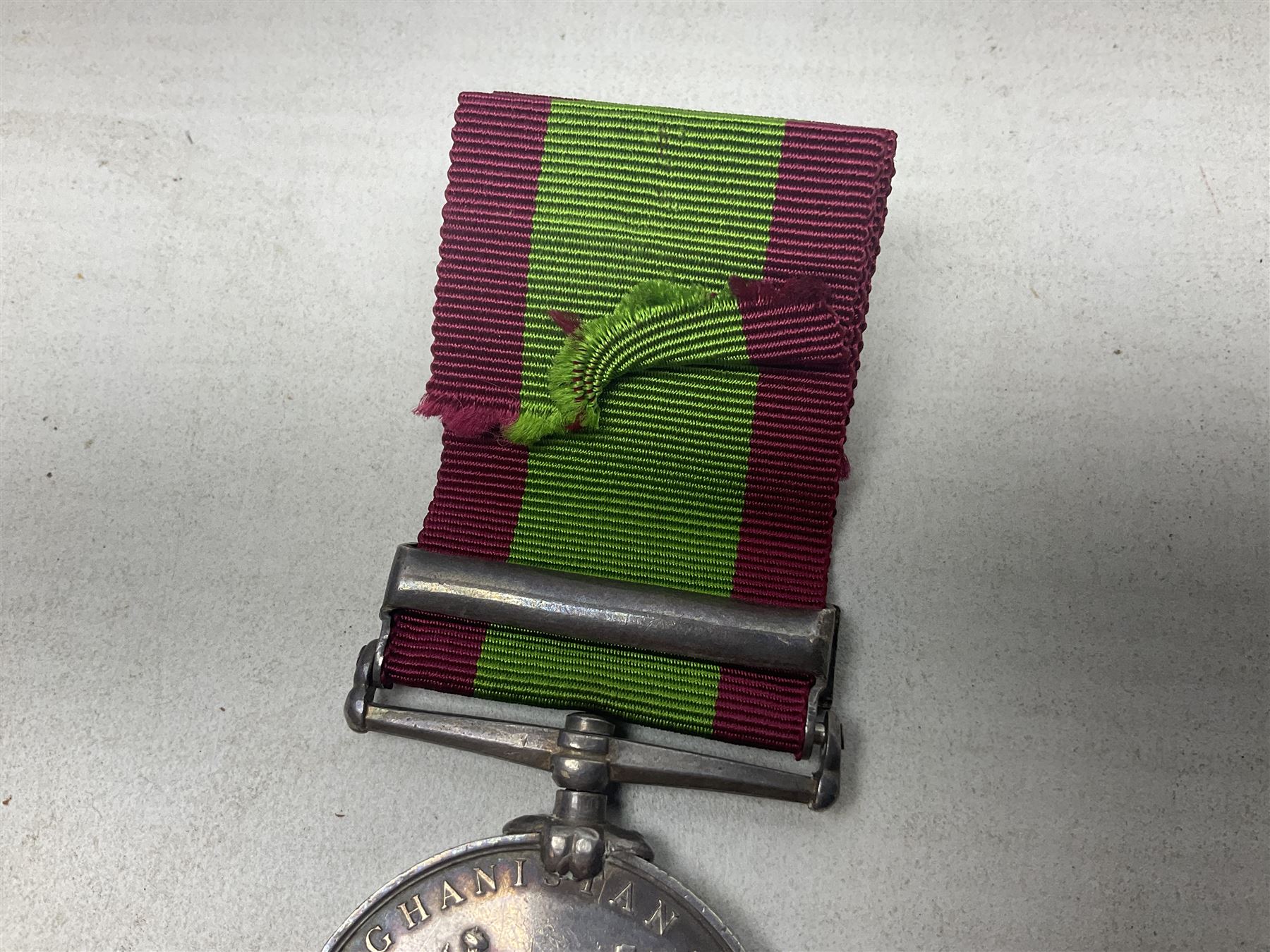 Victoria 2nd Afghanistan War Medal 1878-79-80 with clasp for Kandahar, awarded to 397 Gunr. W. Hogg C. Batt. 2nd Bde. R.A. with ribbon