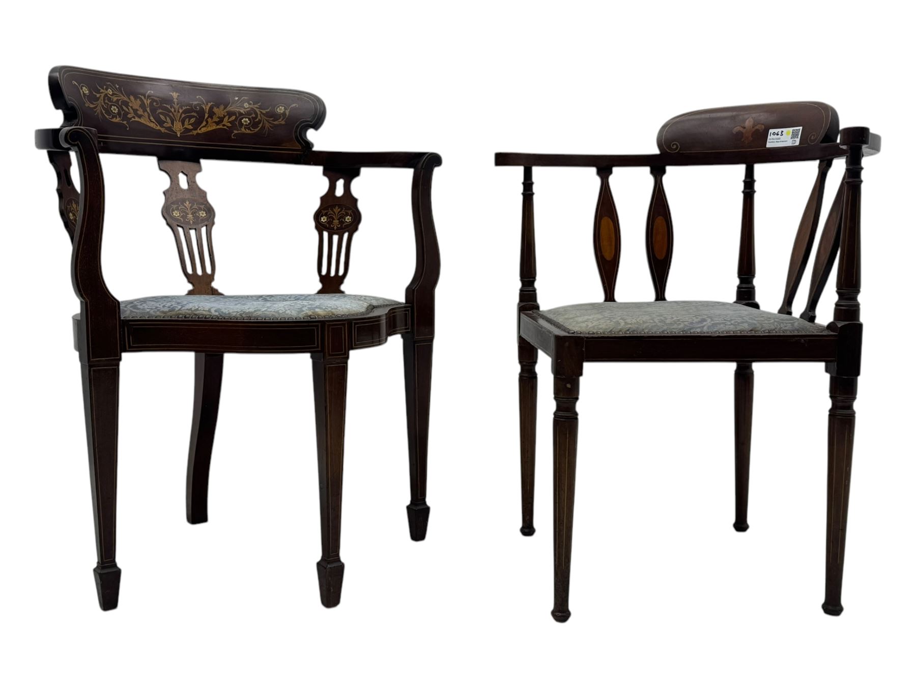 Edwardian inlaid mahogany corner chair, curved arms on shaped splat supports inlaid with satinwood, on turned supports (W60cm, H75cm); Edwardian inlaid mahogany tub-shaped armchair, the cresting rail inlaid with scrolling acanthus leaves and flower heads, on square tapering supports with spade feet (W58cm, H80cm)