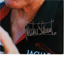 Signed Formula 1 memorabilia, including 1973 Milestones magazine signed to the front cover by Graham Hill and three signed photographs comprising Jackie Stewart, Jack Bradbury and Mario Andretti, with certificate of authenticity from Chaucer Auctions