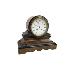 French - 19th century 8-day library clock in a walnut veneered and ebonised case c1870, drum case on a decorative rectangular ogee plinth with a shaped base, enamel dial with Roman numerals, minute track and steel moon hands, countwheel striking movement, striking the hours and half hours on a bell. With pendulum.   