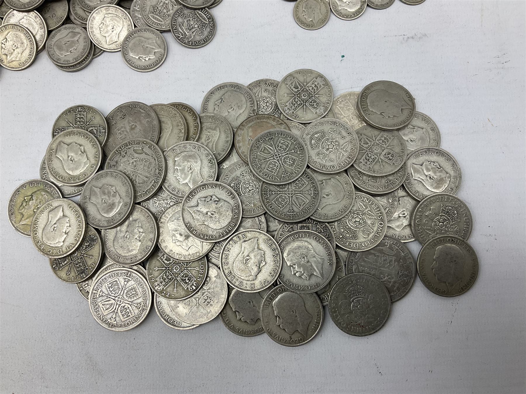 Approximately 1800 grams of Great British pre 1947 silver coins, including halfcrowns, florins, shillings etc