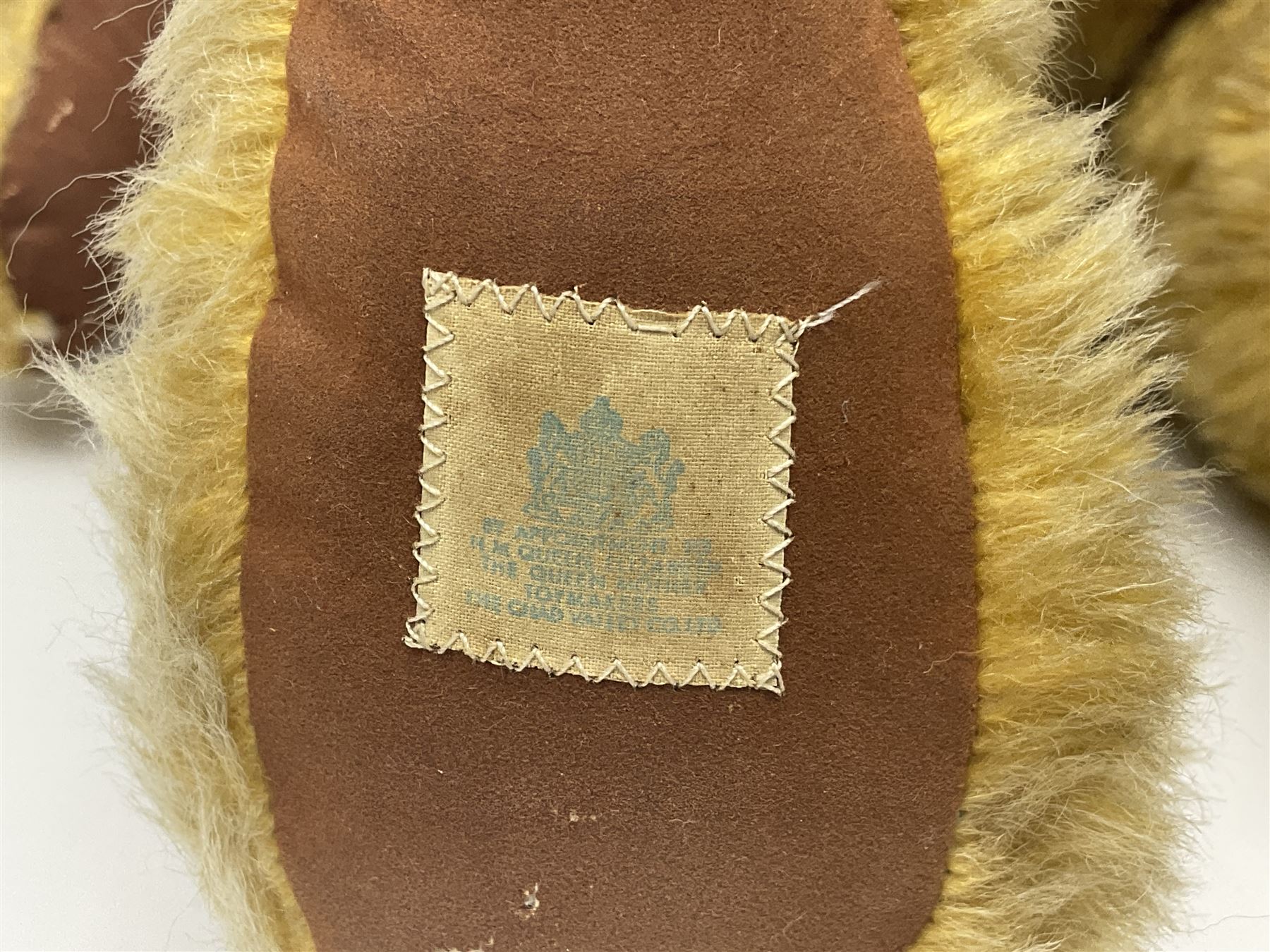 Large post-war Chad Valley plush covered teddy bear with revolving head, applied eyes, vertically stitched nose and mouth, jointed limbs and growler mechanism; stitched label to right foot and Hygenic Toys label to right side H73cm