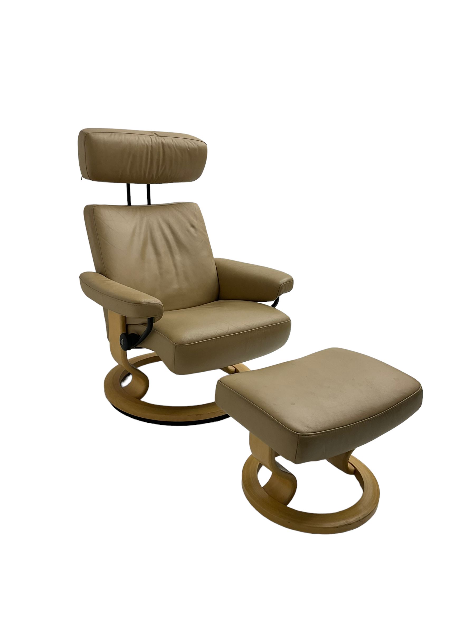 Ekornes Stressless - reclining armchair upholstered in latte leather, with footstool