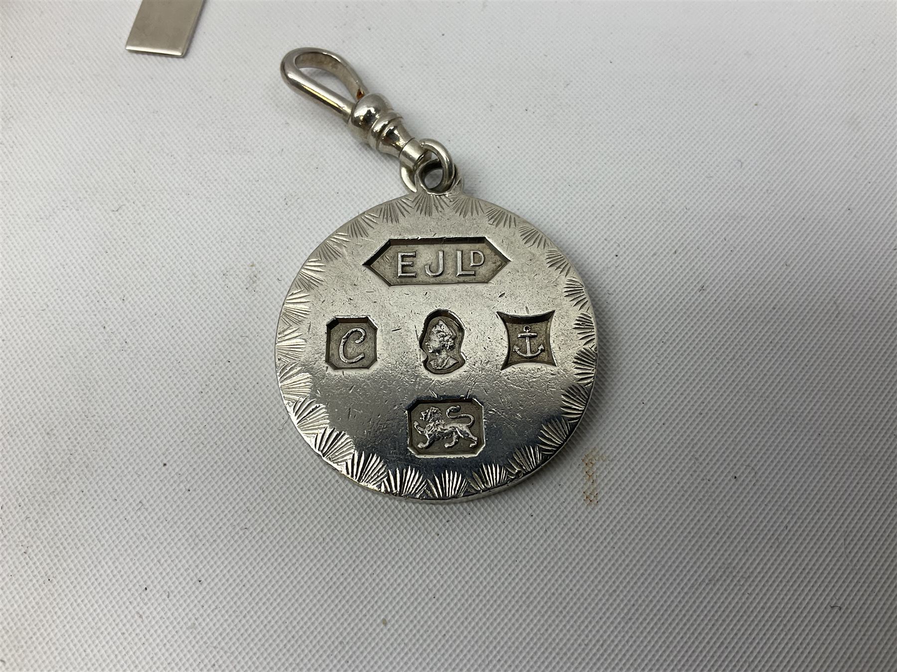 Modern silver locket, modern silver circular pendant, modern silver cross shaped pendant, small 9ct gold and enamel pendant, etc., approximate gross silver weight 40 grams, approximate gold weight 1.3 grams