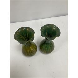 Pair of green glaze Bretby vases of bulbous form with a tulip necks, with impressed mark beneath, H24cm