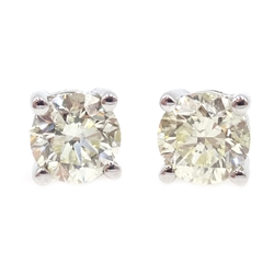  Pair of 18ct white gold (tested) diamond stud earrings, diamonds approx 1.05 carat  