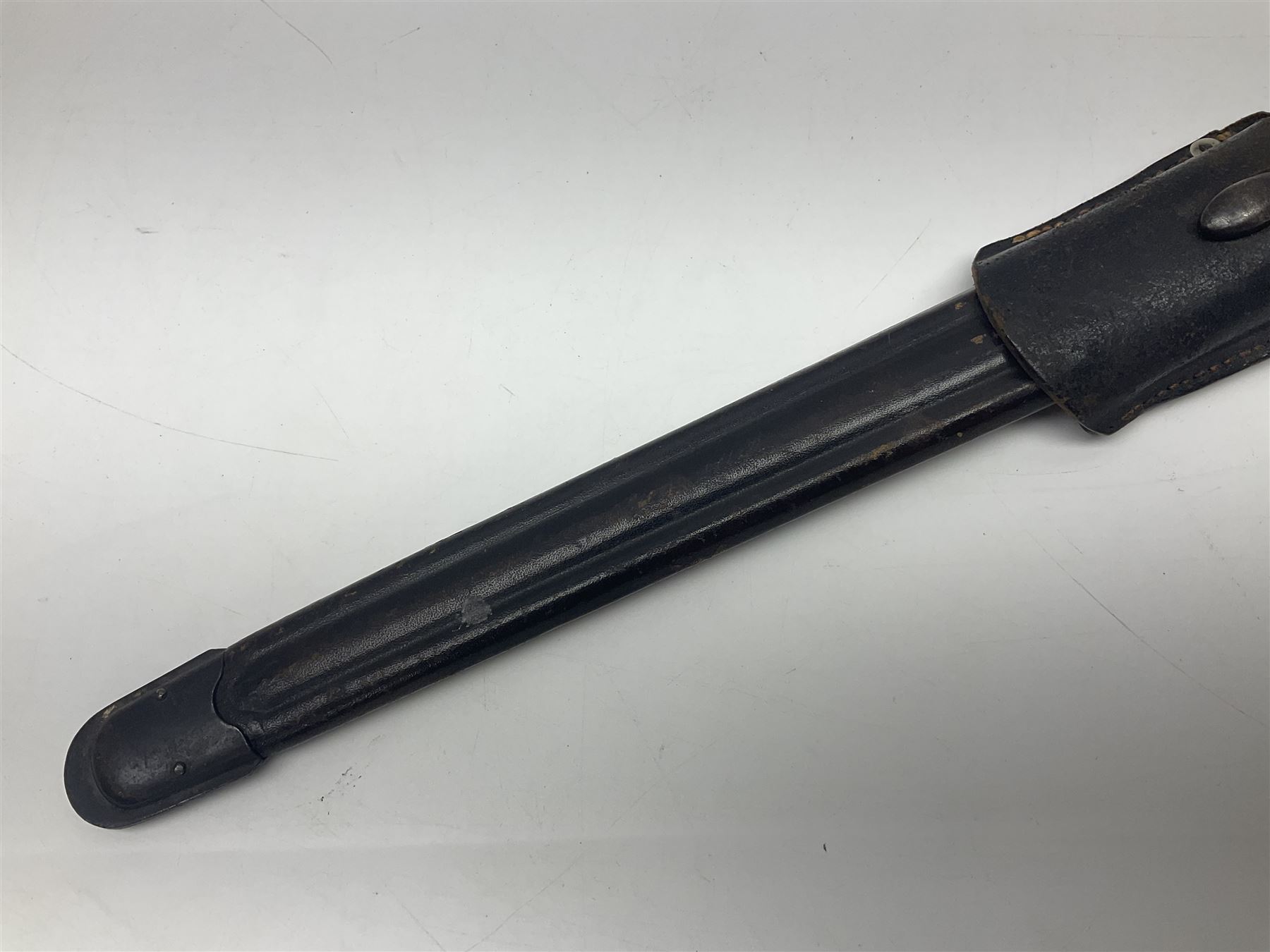 WW2 Italian Model 1891 bayonet with 30cm fullered blade; cross-piece marked PS 1941; in associated leather covered scabbard with frog L45cm overall