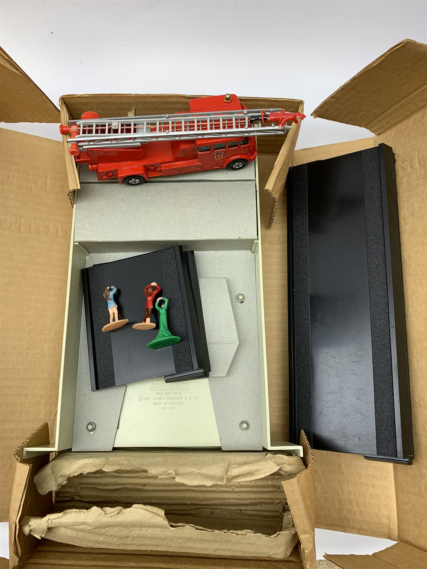 Matchbox Big MX Fire/Rescue and Mechanised Fire Engine No.BM-6; and Matchbox Big MX Power Activator; both boxed; together with a Tri-ang/Hornby '00' gauge model railway tunnel No.R576, boxed (3)