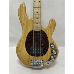 Ernie Ball Music Man Sting Ray 4 string bass guitar, in natural finish with roasted maple neck and tortoiseshell effect scratch guard, serial no 87485, in black Music Man hard case, guitar L114cm