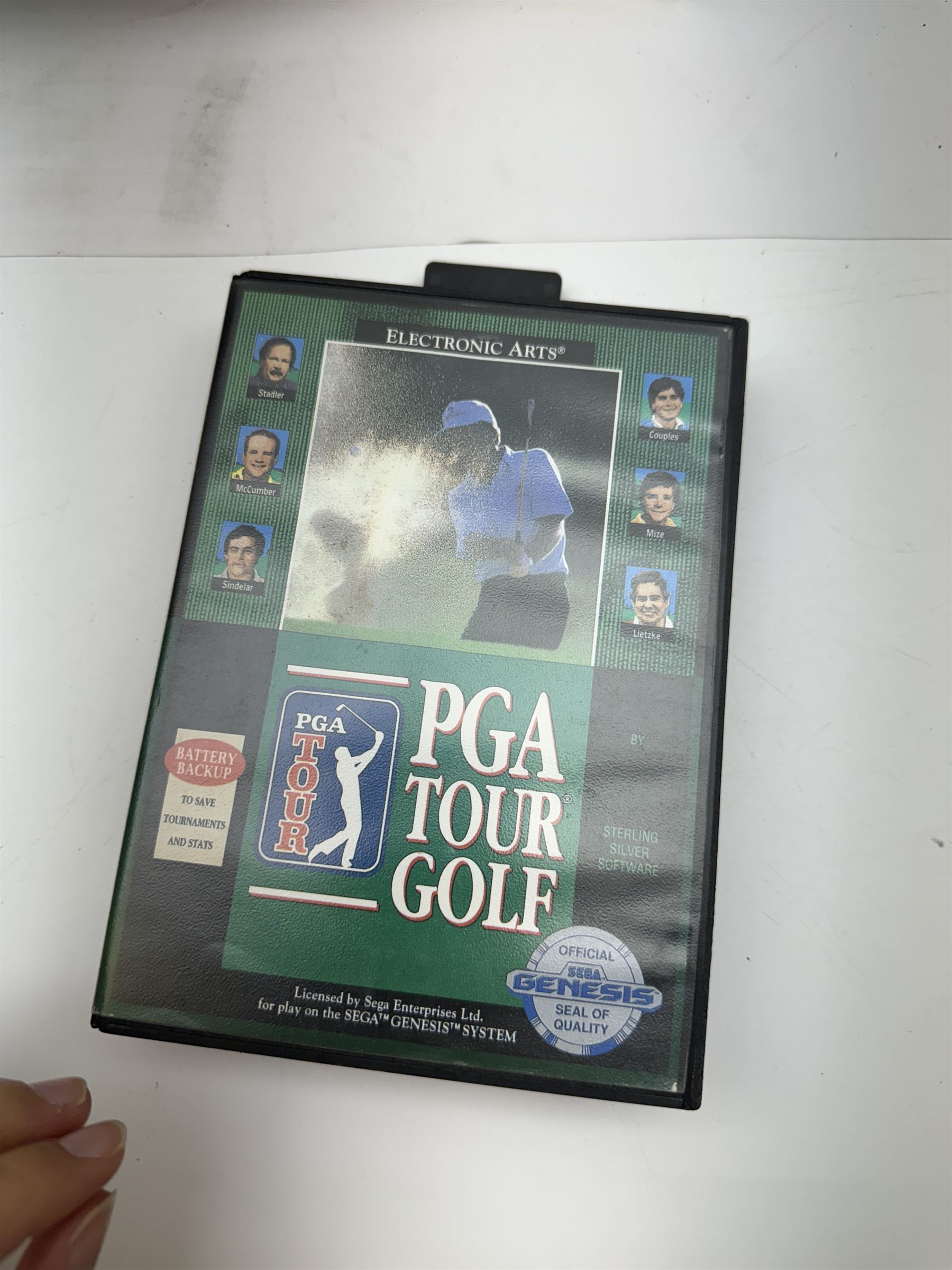 Eighteen Sega Mega Drive games, including Sonic The Hedgehog, Sonic The Hedgehog 2, Alienstorm, Desert Strike, Fatal Rewind, Road Rash etc, all boxed, together with a Sega Mega Drive controller, cartridge converter and an arcade power stick controller