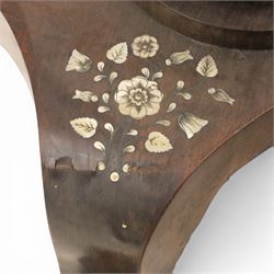 Victorian mahogany and mother-of-pearl inlaid work table, the octagonal hinged top enclosing a mirror and fitted compartmented interior, raised on a carved pedestal and quatriform platform base with scrolled feet