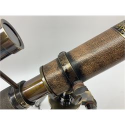 Reproduction brasses telescope on tripod stand with plaque detailed ‘Kelvin & Hughes London 1917’, H33cm