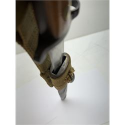 WWII Lee Metford rifle bayonet with original scabbard marked 586, with canvas frog, L44cm overall 
Notes; due to the condition of the bayonet it is possible this was issued to the home guard