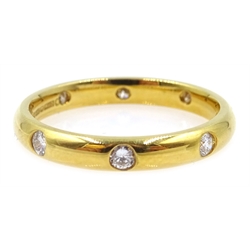  18ct gold ring inset with eight diamonds halllmarked  