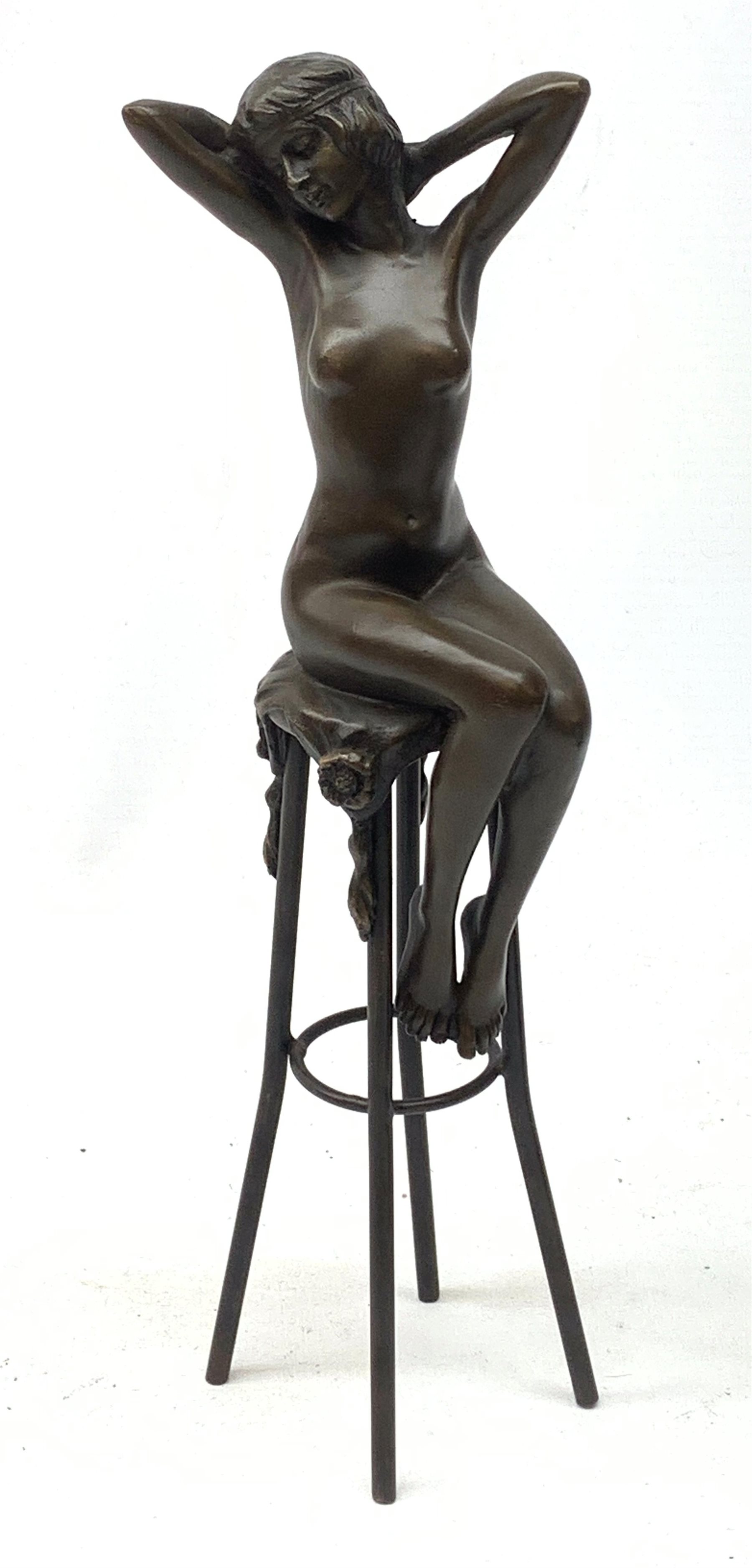 After D H Chiparus, an Art Deco style bronze modelled as a nude female figure seated upon a chair, H28cm. 