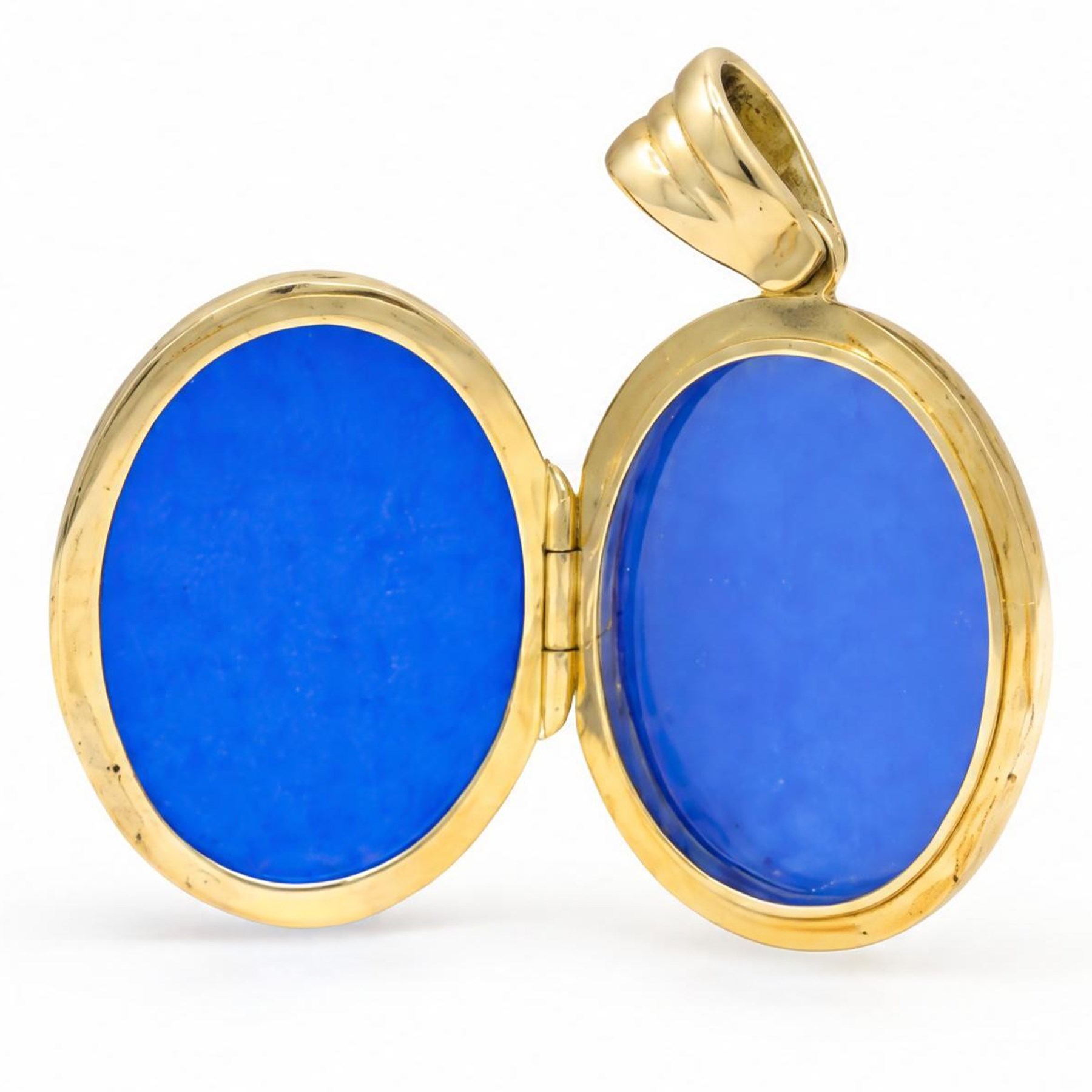 18ct gold diamond and enamel locket pedant, the oval blue enamel front inlaid with a gold star, set with round brilliant cut diamonds, Birmingham 2001