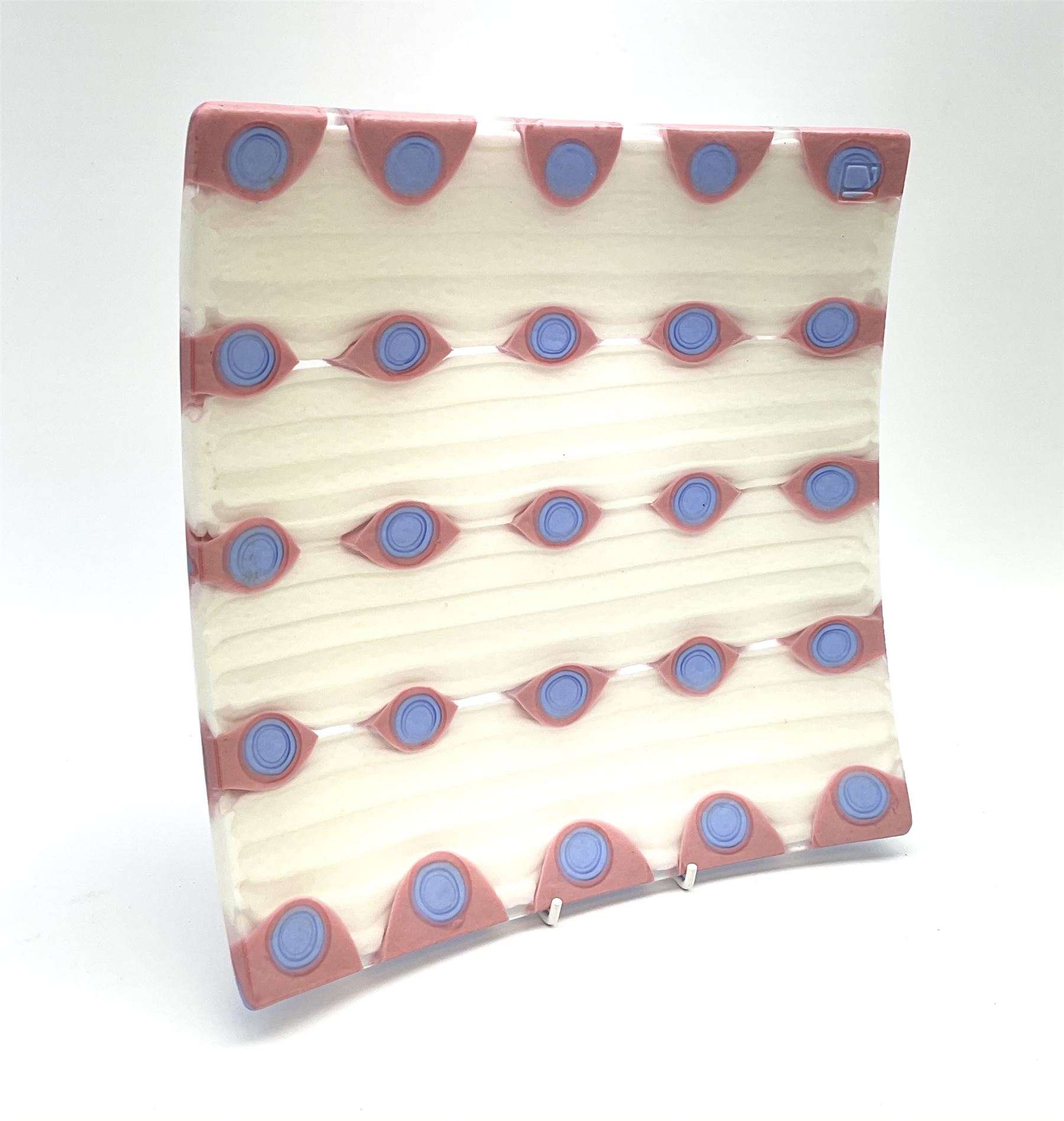 Zdenek Lhotsky glass platter, decorated with geometric motifs in pink and blue upon a white ground, L26cm, with certificate and box.