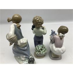 Six Lladro figures, comprising Naughty Dog no 4982, Best Friend 7620 and My Buddy no 7609, Kitty Confrontation no 1442, It Wasn't Me no 7672 and Rabbit Eating no 4772, three with original boxes, largest example H22cm