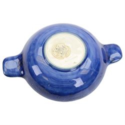 Two Moorcroft ashtrays in Magnolia pattern and Anemone pattern, together with pin dish in anemone pattern  