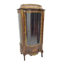 Early 20th century French kingwood vitrine or display cabinet, decorated with applied foliate cast band, serpentine glazed door and sides, inlaid with marquetry decoration of floral bouquets and branches, cartouche mounts to the apron, raised on cabriole supports