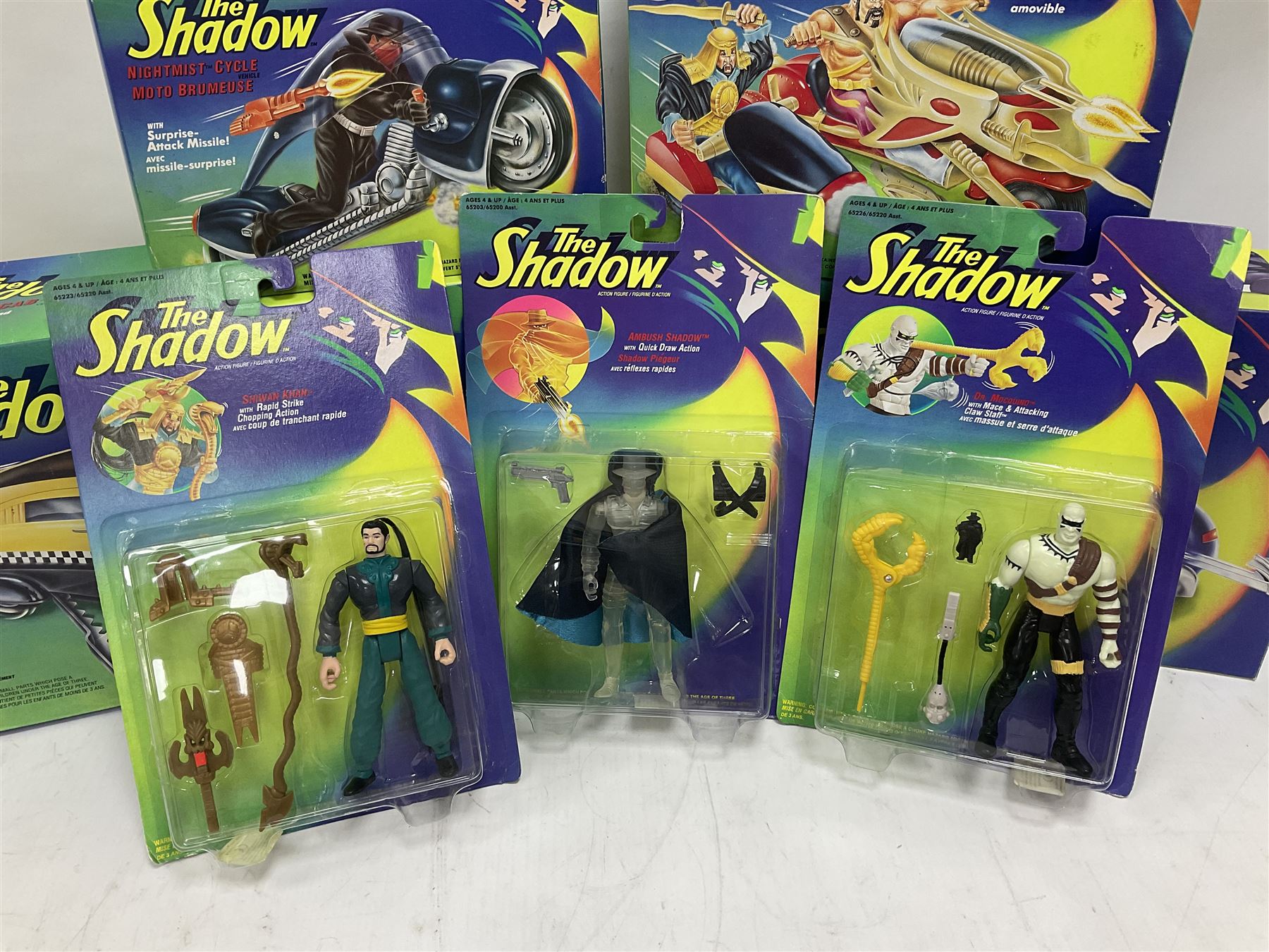 The Shadow - Kenner Thunder Cab; Mirage SX-100 car; Shiwan Khan Serpent Bike; and  Nightmist Cycle; all boxed; and eight Kenner unopened carded action figures (12)