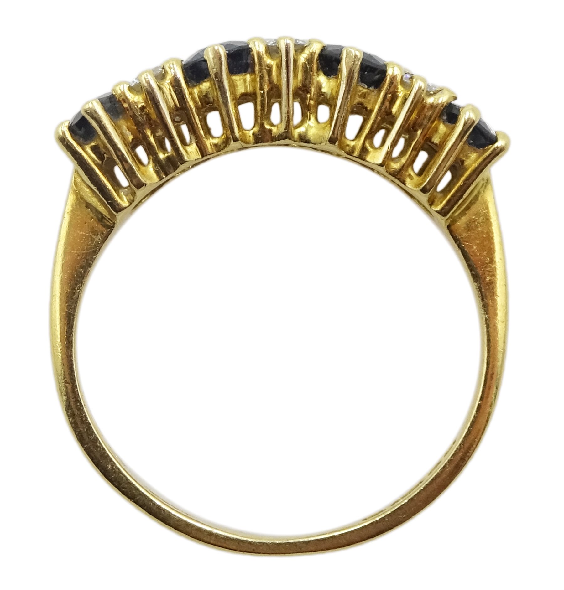 18ct gold four stone oval sapphire and six stone diamond ring, London 1981