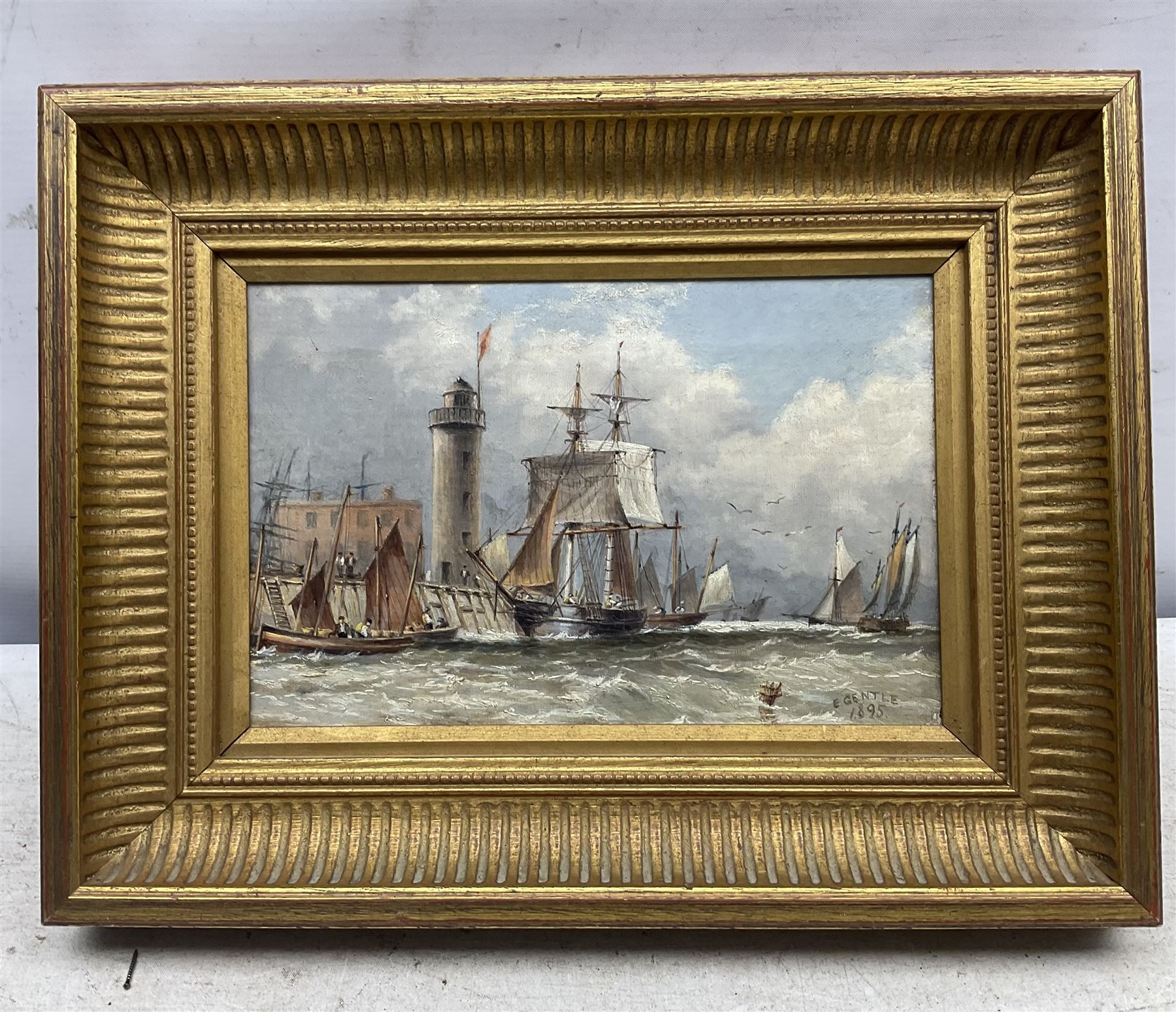 Edward Gentle (British 1823-1910): 'Scarborough Pier and Lighthouse', oil on canvas signed and dated 1895, titled verso 14cm x 22cm 