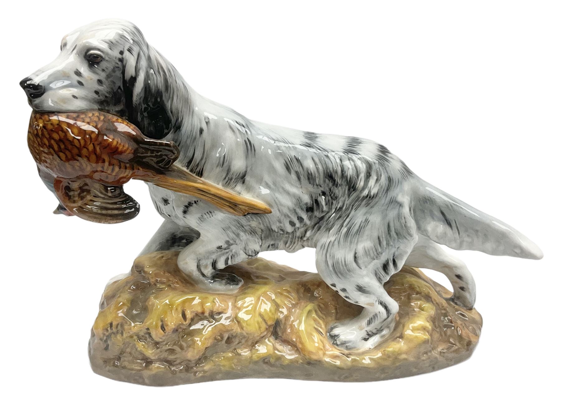 Royal Doulton model of an English setter carrying a pheasant, HN 2529, designed by Frederick Daws, H21cm
