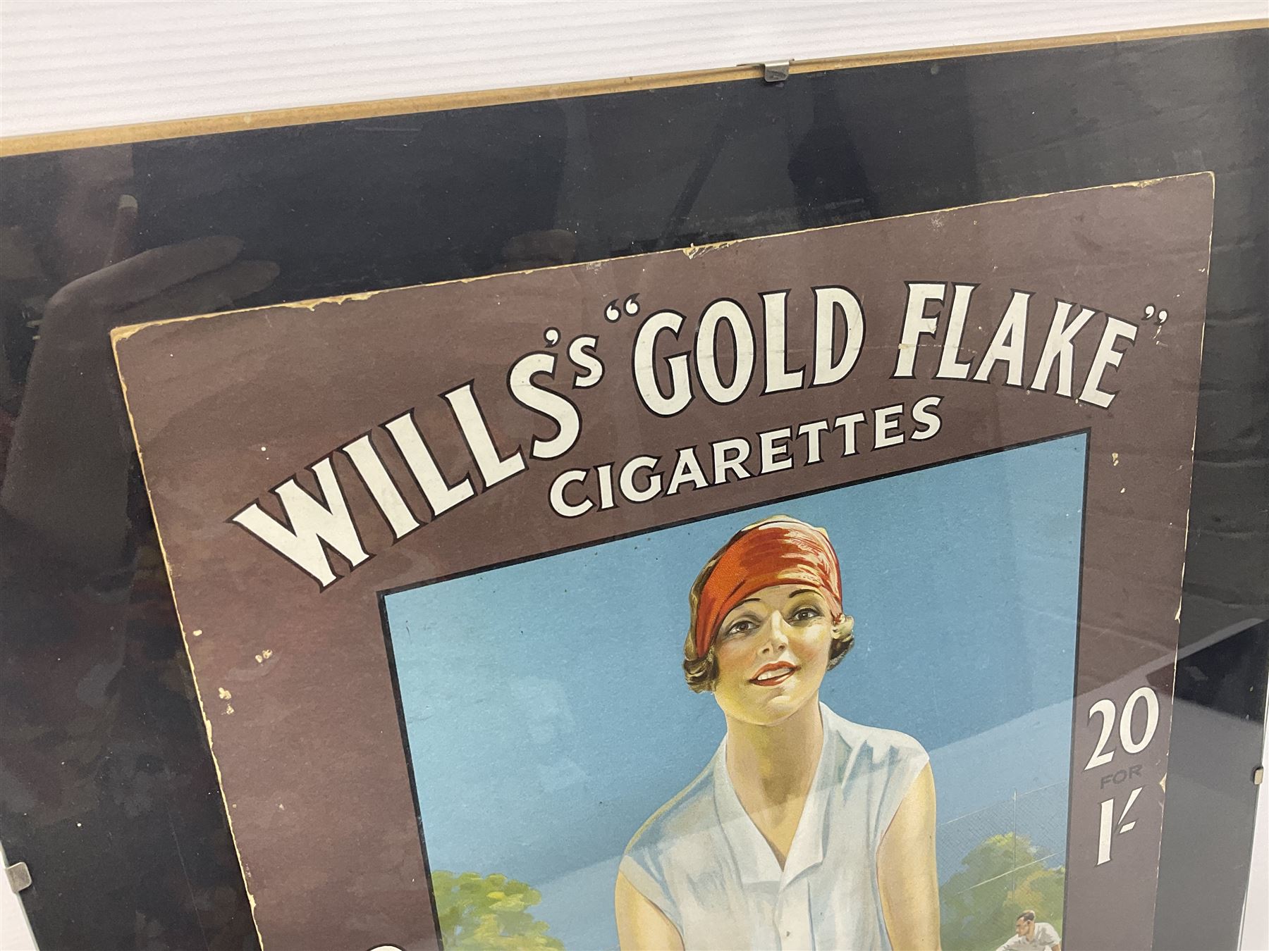 Wills Gold Flake Cigarettes advertising board, framed depicting a lady at the tennis, advert H51cm, L38cm