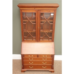  Small 19th century style mahogany bureau bookcase, two glazed doors enclosing shelves above fall front enclosing fitted interior, two short and three long drawers on bracket supports, W61cm, H117cm, D29cm  