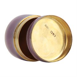 Small early 20th century silver gilt and lilac guilloche enamel box, of cylindrical form, the cover lifting to reveal a gilt interior, hallmarked Asprey & Co Ltd, London 1910, H2.5cm D4cm