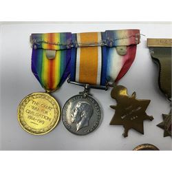 Made-up group of three WWI medals comprising 1914 Star awarded to 23598 Gnr. F. Jefferson R.G.A., British War Medal and Victory Medal with names removed; with ribbons on wearing bar; 1942 Motorist's Medal and small quantity of cap badges, Royalty badges etc