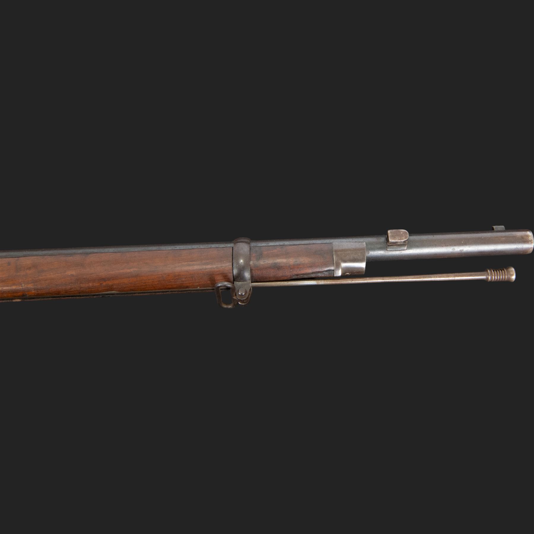 Snider-Enfield service rifle .577 calibre, barrel 33 in., tangent/ladder back sight, action marked with crowned V.R BSA & Co 1872, full stocked with two barrel bands, steel clearing rod, walnut stock marked Mx1 93 Birmingham, overall L124cm