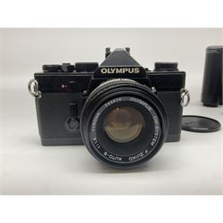 Olympus OM-1 camera body, serial no 913212, with 'Olympus OM-System F.Zuiko Auto-S 1:1.8 f=50mm' lens, serial no.74374, 'Vivitar wide angle MC 28mm 1:2.8 49mm' lens, serial no. 42042268, and Olympus OM winder 2