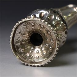 George III silver cream jug, of baluster form with hammered dimpling throughout and scroll handle, upon circular spreading foot with beaded edge, hallmarked Thomas Shepherd, London 1784, H10cm