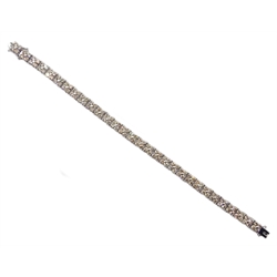  White gold diamond flower design line bracelet stamped 18K, total diamond weight 10.00 carat  