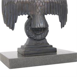 Composite cast bust of Hitler, together Third Reich Nazi German style desk stand depicting the national eagle and swastika on a black stone base, together with two other figures, bust H17cm 