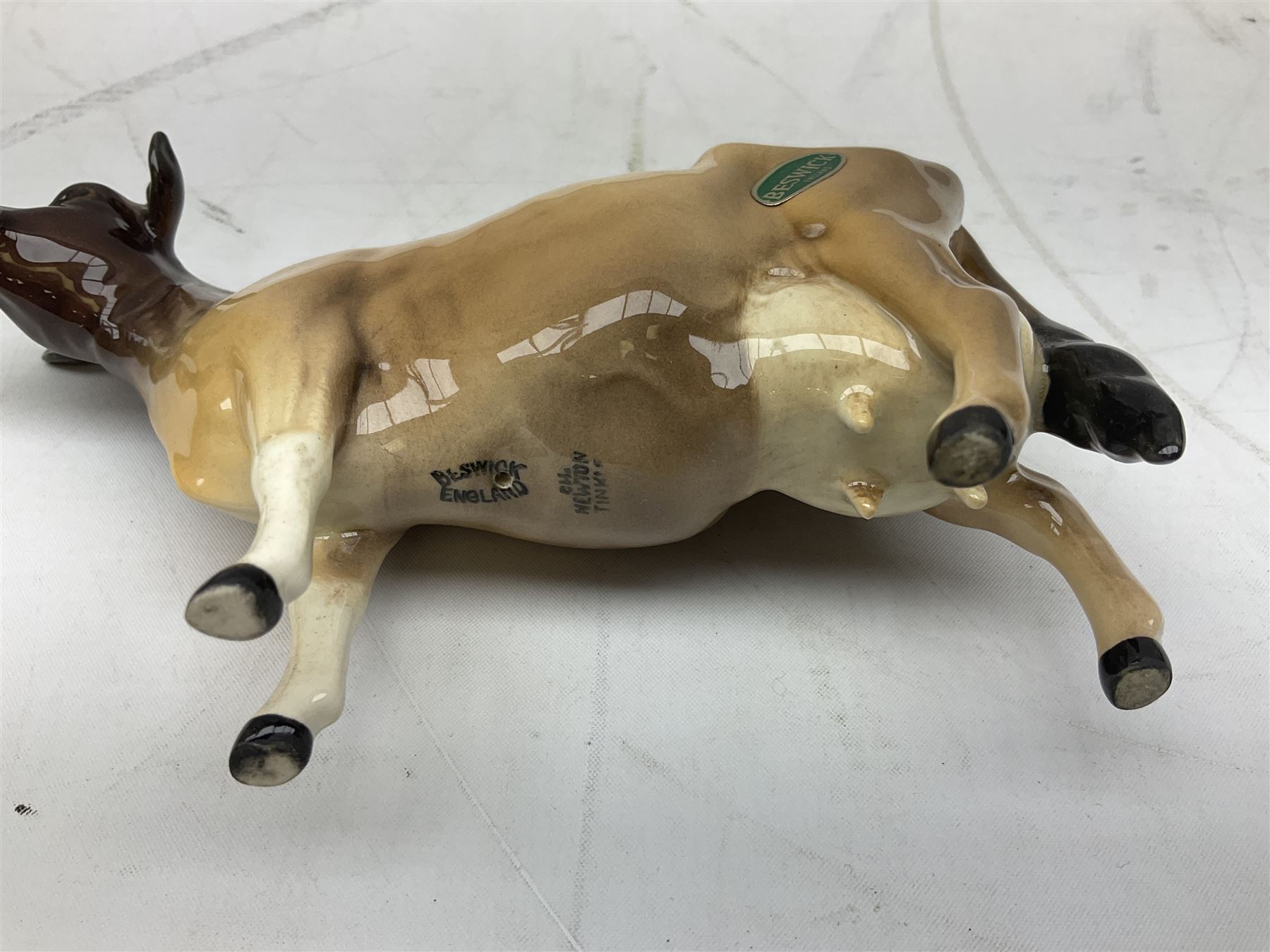 Seven Beswick cow figures, to include Friesian bull Ch. ''Coddington Hilt Bar'' no. 1439a, Friesian cow Ch. 'Claybury Leegwater' no. 1362a and Friesian calf no. 1249C, Aberdeen Angus calf 1827a, Jersey cow no. 1345 etc, all with printed mark beneath  