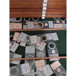 Victorian collector's specimen cabinet, containing a number of prepared microscope slides including miniature photographs, animal and human pathological, physiological and histological specimens and botanical specimens, mostly annotated in ink, the cabinet with glazed door, the drawers with bone handles and lined with green felt, owned by Dr Arthur Bristow, together with a picture of the doctor, cabinet H43cm