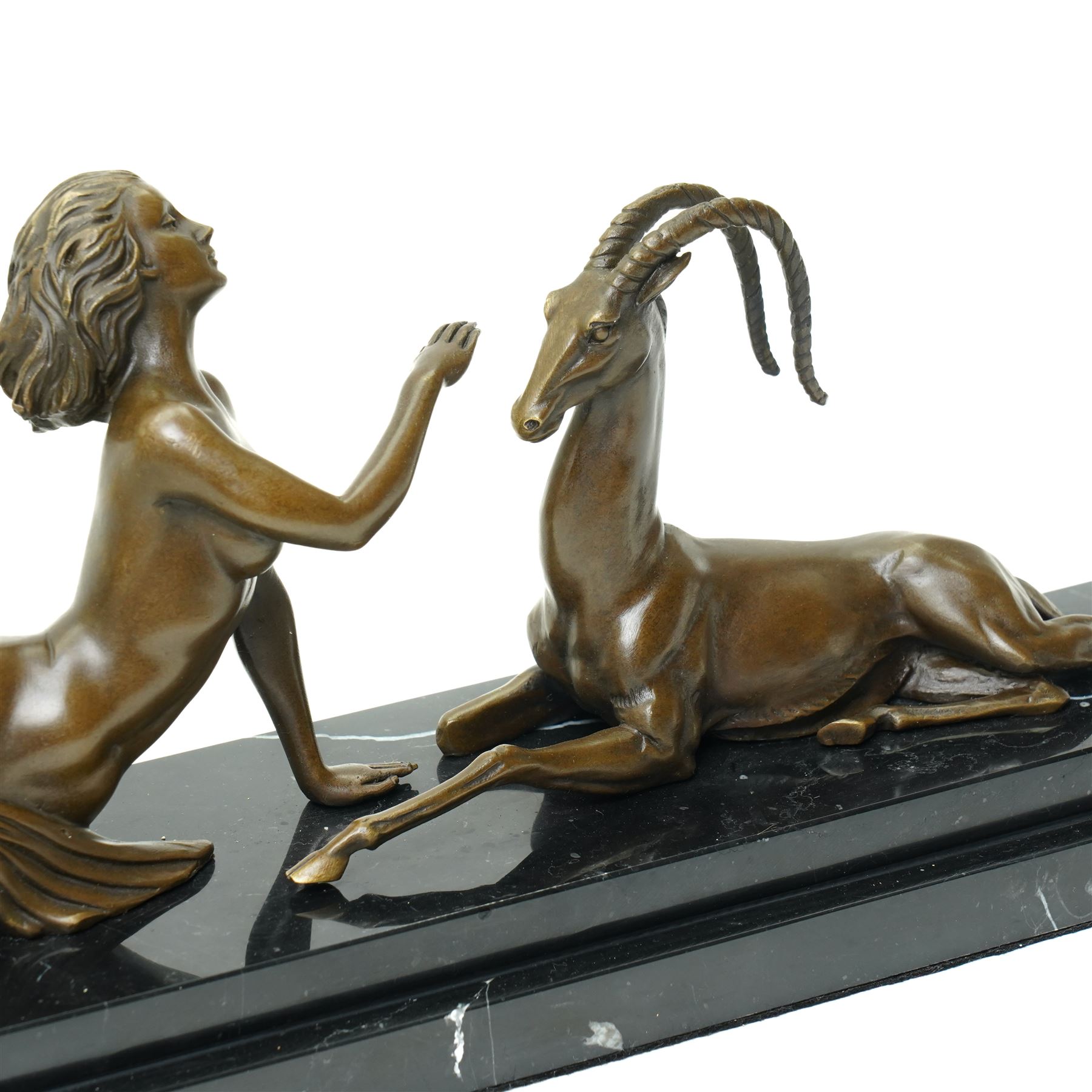 After Pierre Le Faguays (French 1892-1962): 'The Seduction' - Diana with Gazelle, bronze signed Milo, on two tier base, overall W48cm 