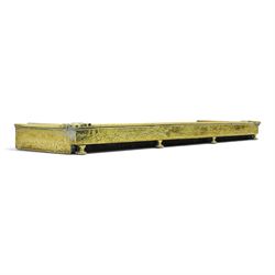 Two Edwardian brass fire curbs, comprising a decorative example with pierced vertical frieze, applied Tulips (H 21cm, W 126cm, D 32cm), together with a hammered moulded example with acanthus corners (H 12cm, W 138cm, D 37cm)
