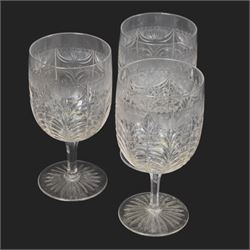 Six cut glass goblets, each with etched and cut floral decoration, together with eight similar bowls, a pair of Waterford Crystal glasses, eight champagne coupes etched with Greek Key border and four etched with floral border