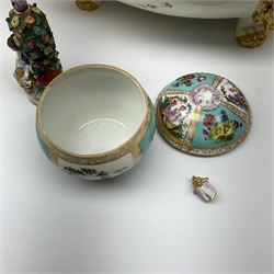 A pair of Bloor Derby tureens and covers, decorated with cornflowers, together with a Helena Wolfsohn pot and cover, painted with panels of courting figures and floral sprays upon a light blue ground, with painted mark beneath, the cover with floral finial (detached by present), not including finial H8cm, a Continental figure modelled as an apple seller, with blue crossed sword mark beneath, H13cm, and a smaller figure modelled as a courting couple before boccage type tree, with spurious gold anchor mark, H10.5cm. 