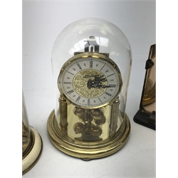  Mid 20th century anniversary clock under glass dome, two other similar anniversary clocks and a 30-hour mantle clock (4)  
