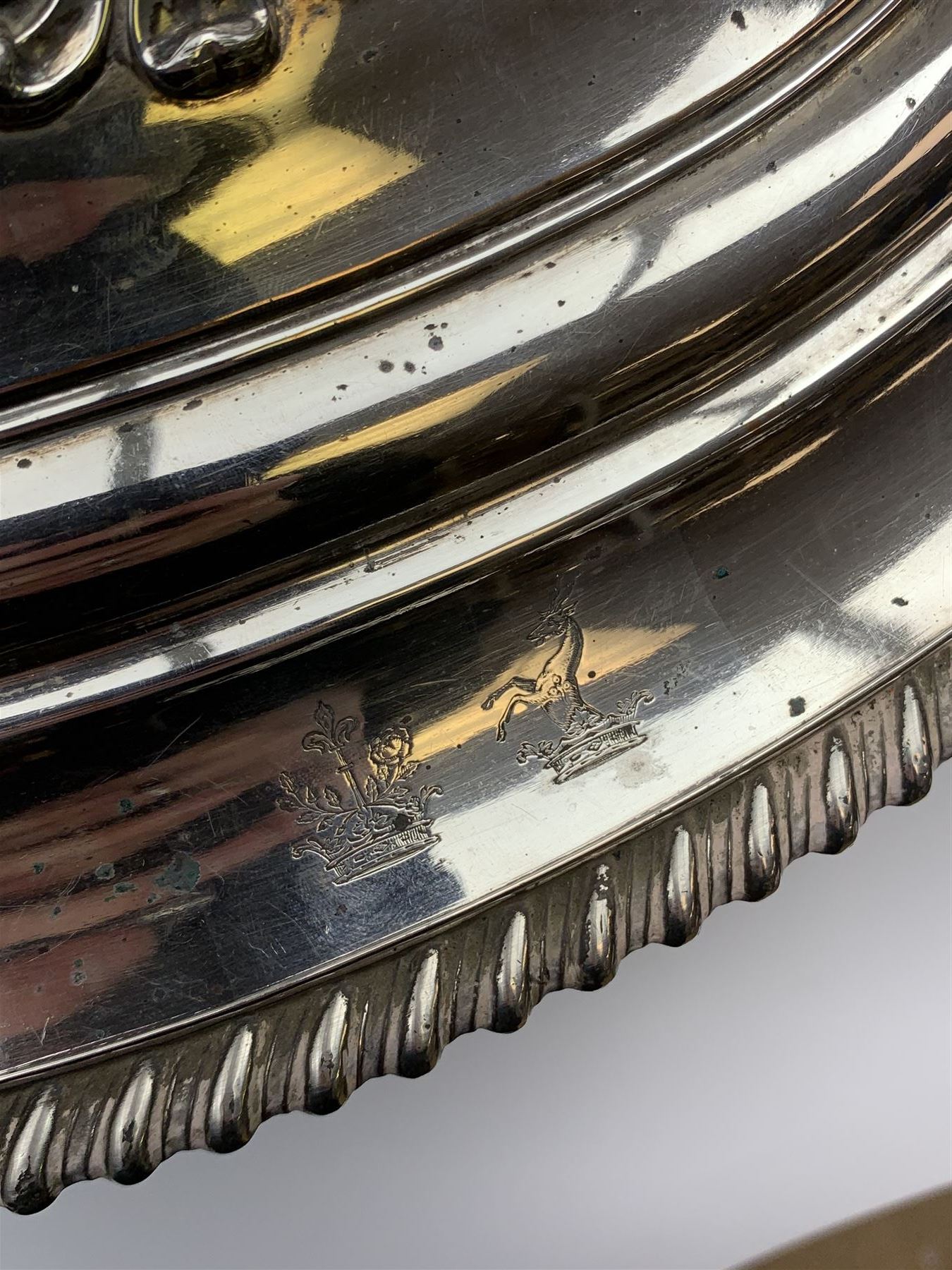 Matthew Boulton silver plated tureen and cover, the body of oval form with twin handles engraved with crest, probably for Whitgreave/Whitgrave family of Moseley Staffordshire, 'Regem Defendere Victum', (To defend the king even in his defeat/To defend the conquered king ), upon four paw feet, the cover with gadrooned rim and foliate loop handle 