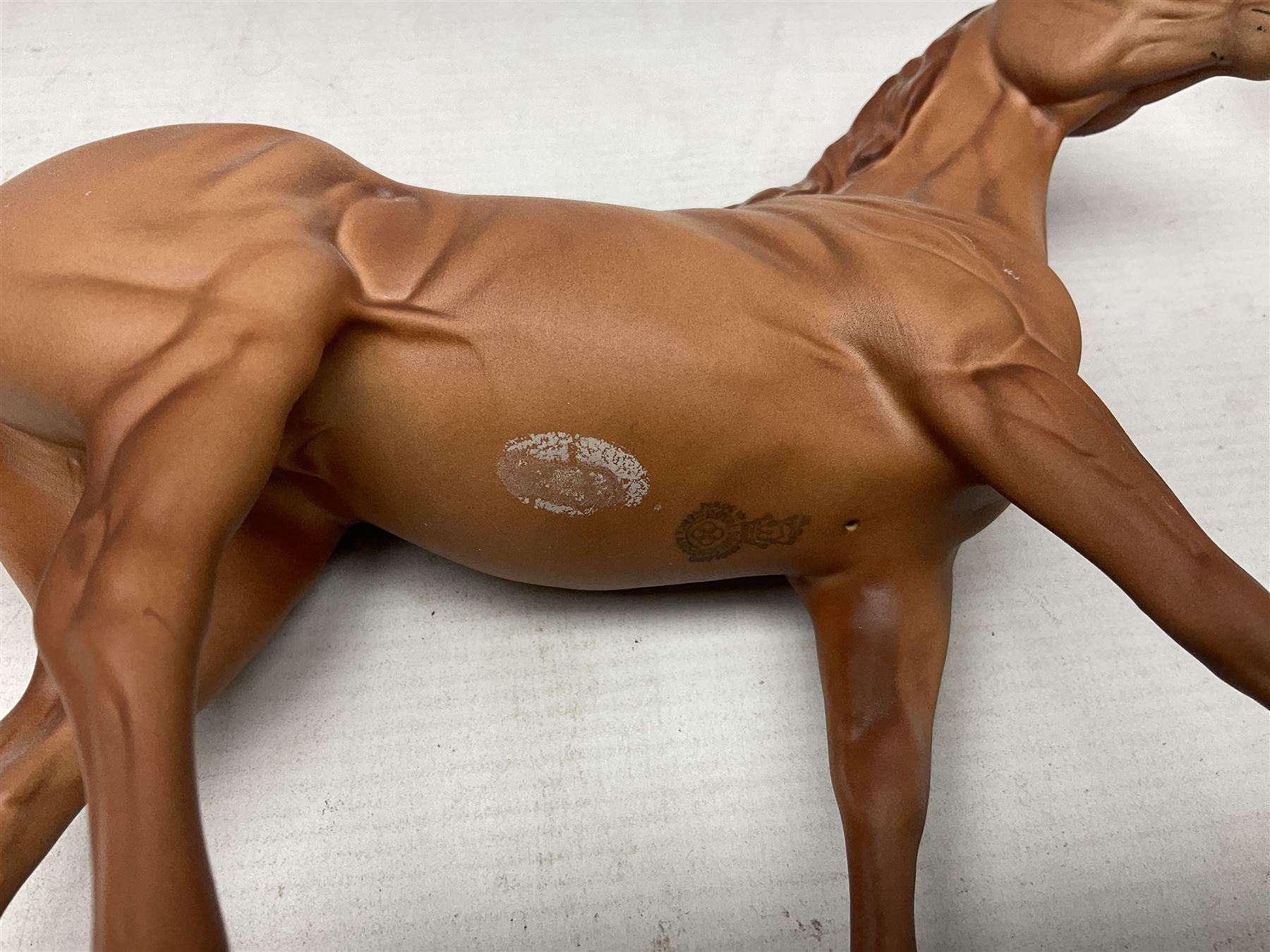 Collection of Beswick horse figures, to include Red Rum on a wooden plinth,  Lammtarra on oval plinth, Morgan Horse Black and three others, together with Royal Daulton Appaloosa Foal and a USSR horse