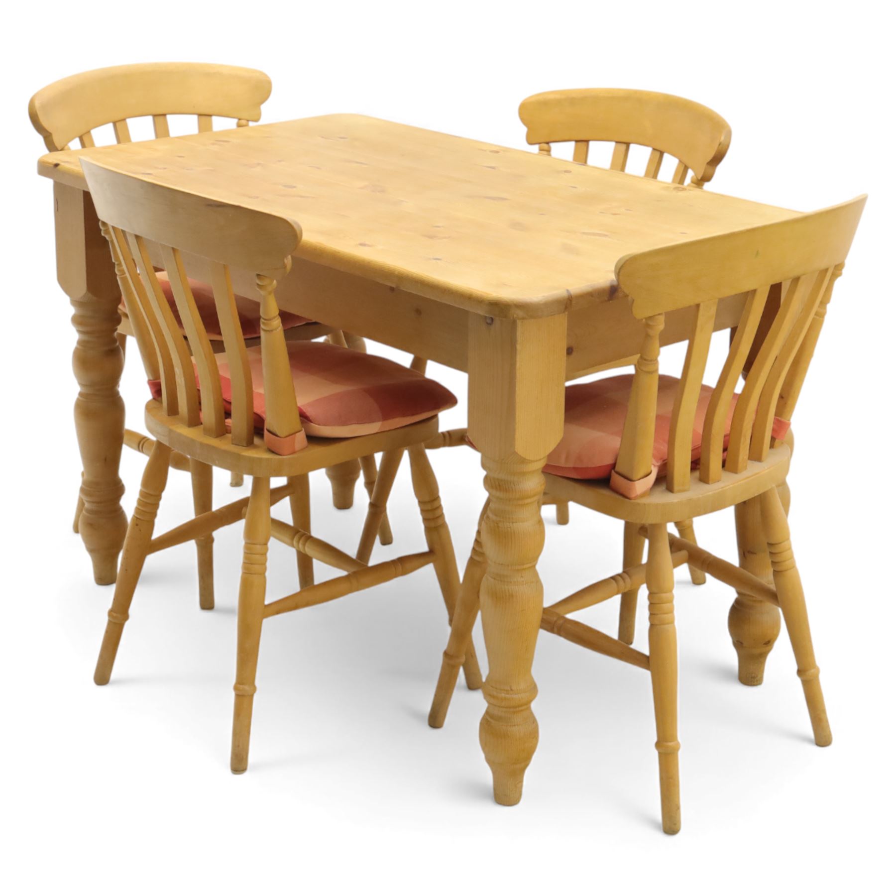 Late 20th century pine farmhouse dining table, rectangular top raised on turned legs, together with a set of matching spindle-back chairs with padded seats