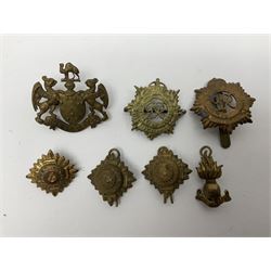 WW2 German Luftwaffe Mess cutlery comprising table spoon and fork, each with H.M.Z.38 mark; WW1 British War Medal awarded to L-13858 Gnr. J. McCabe R.A.; and small quantity of military badges, rank pips etc