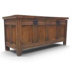 Large 17th century oak coffer, plank top with moulded edge, four panel front with channel ...